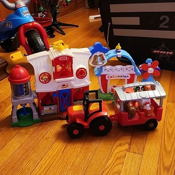 Fisher price barn, little people tractor, and cocmelon barn - Picture 1 of 4